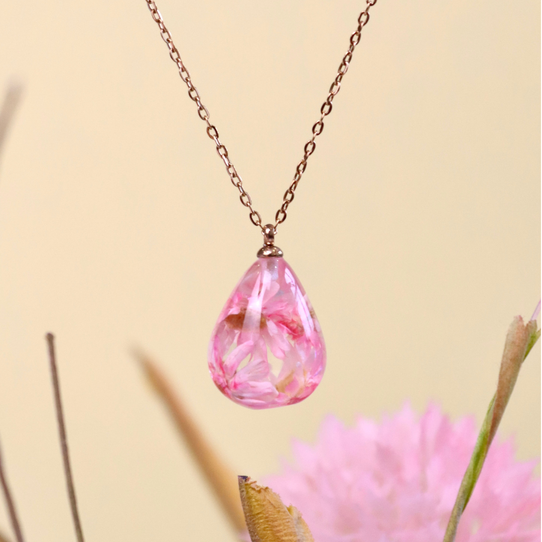 Collana RUGIADA in acciaio inossidabile e ciondolo in resina con Glixia rosa