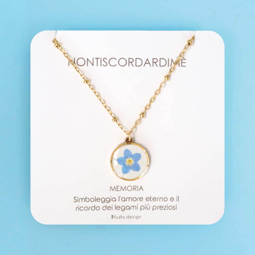 Collana in acciaio inox e ciondolo medaglione in resina con fiore vero Nontiscordardimé