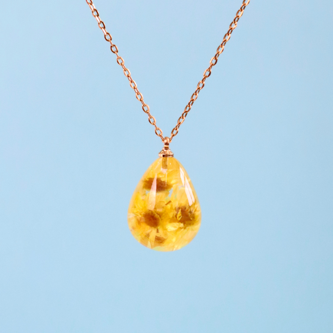 Collana RUGIADA in acciaio inossidabile e ciondolo in resina con Glixia giallo