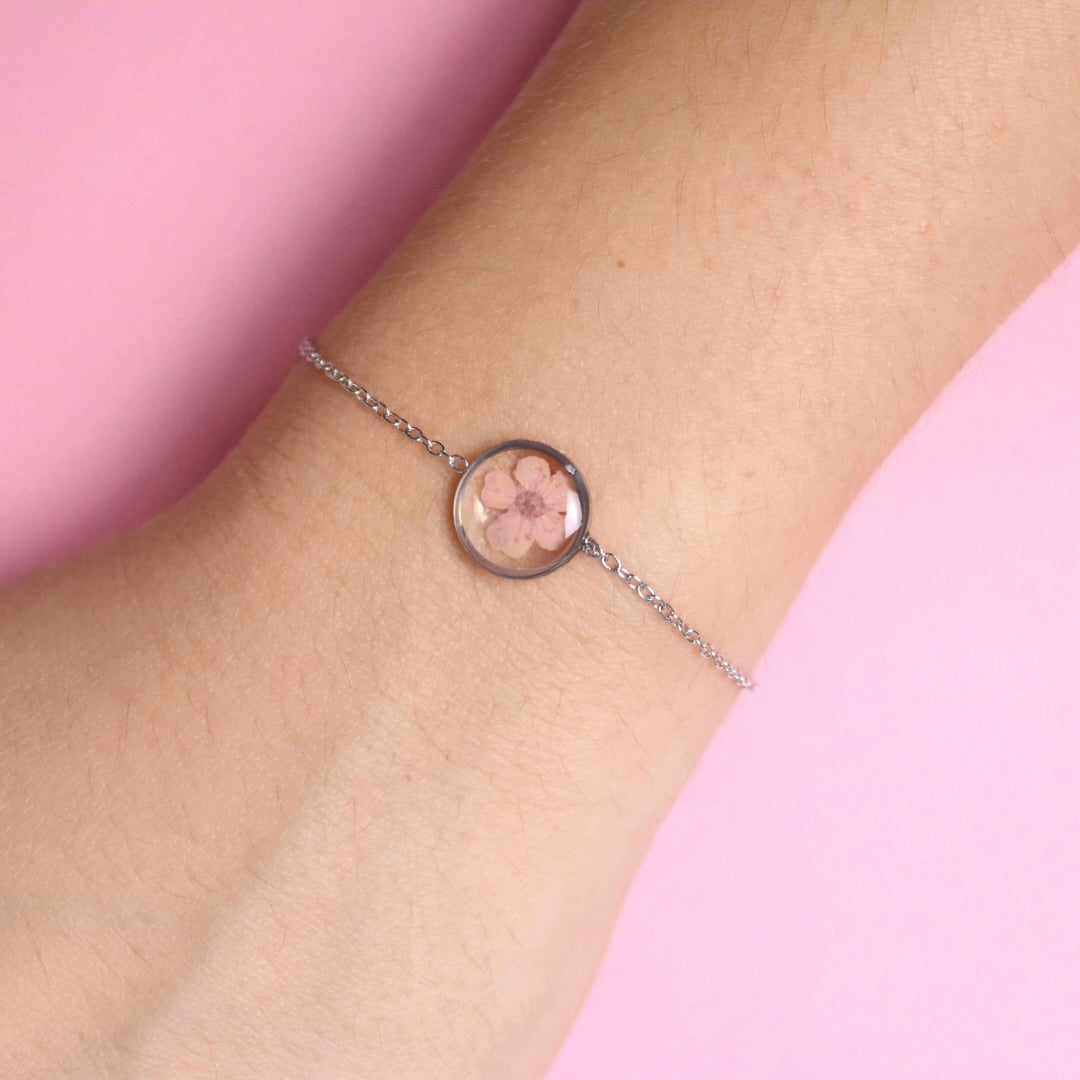 Bracciale in acciaio inox con ciondolo in resina e Fiore Selvatico rosa