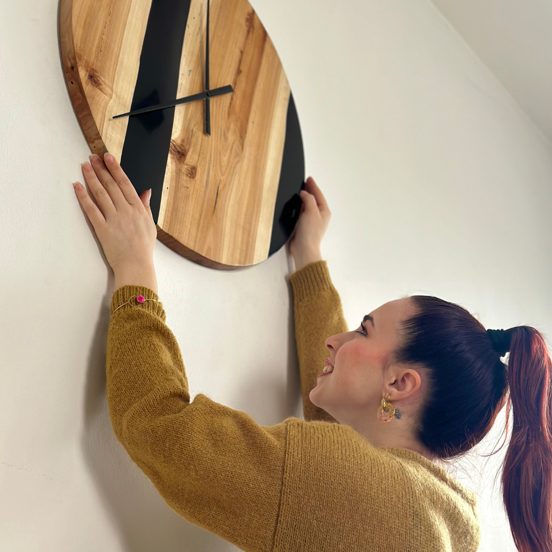 Orologio da parete in legno e resina nera Ø54cm