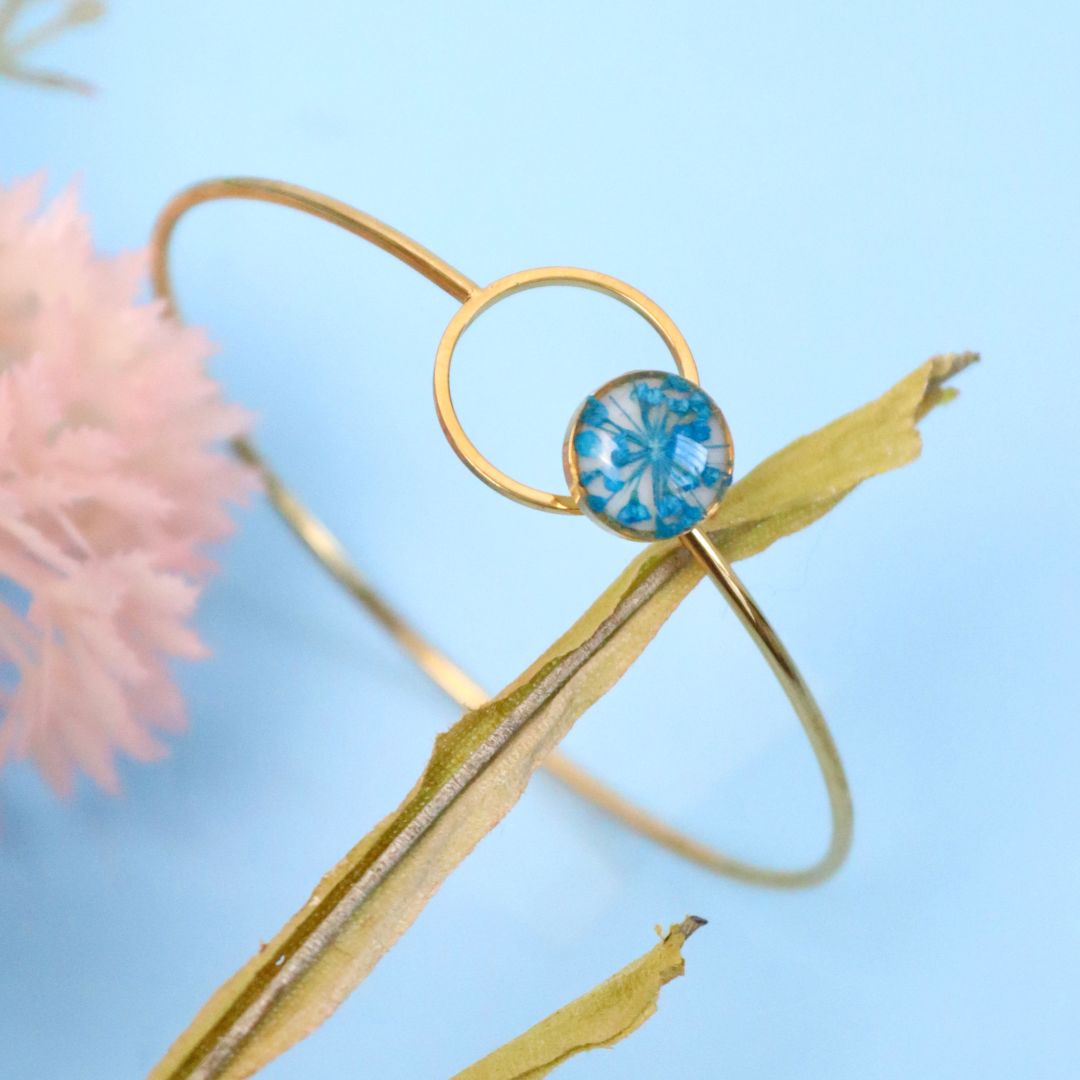 Bracciale ABBRACCIAMI in acciaio inox con resina e Pizzo della regina Anna blu