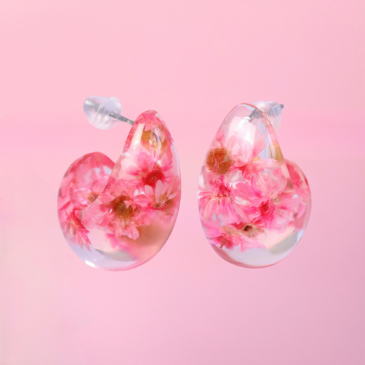 Orecchini a bottone a forma di goccia dupe in resina con fiori veri Glixia rosa