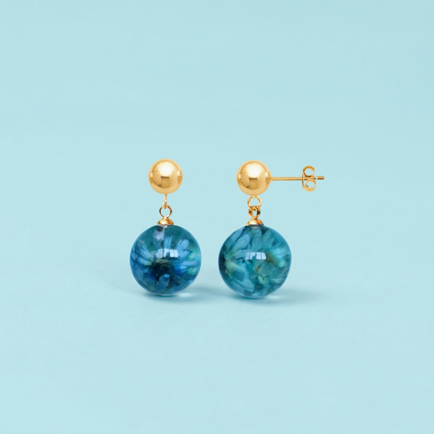 Paio di orecchini MINI BOLLE BLU - sfere pendenti con fiore vero Glixia blu e montatura acciaio inox