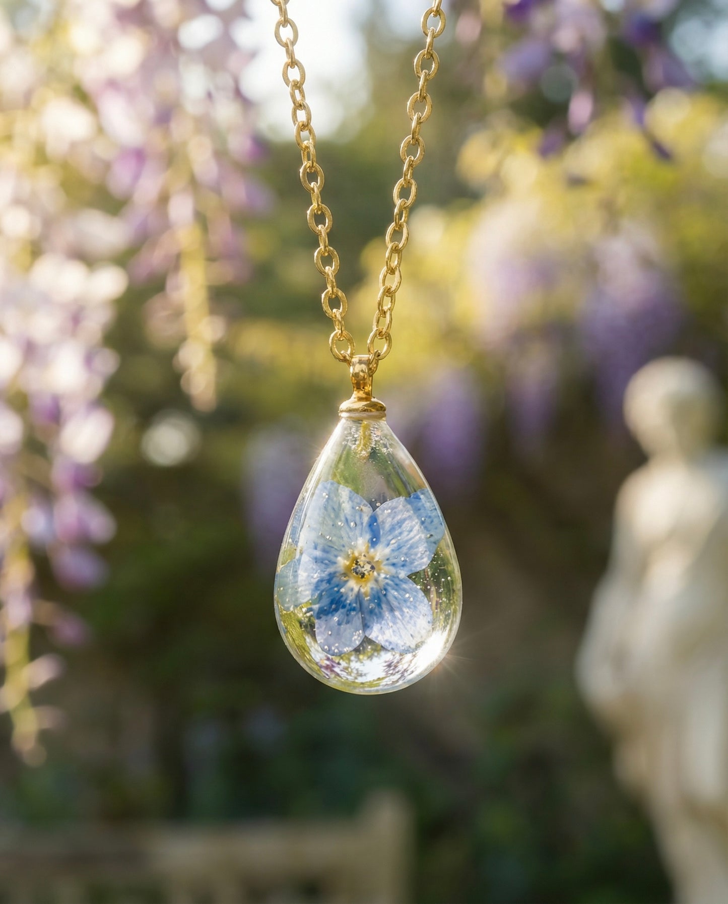 Collana RUGIADA in acciaio inossidabile e ciondolo in resina con Nontiscordardimé