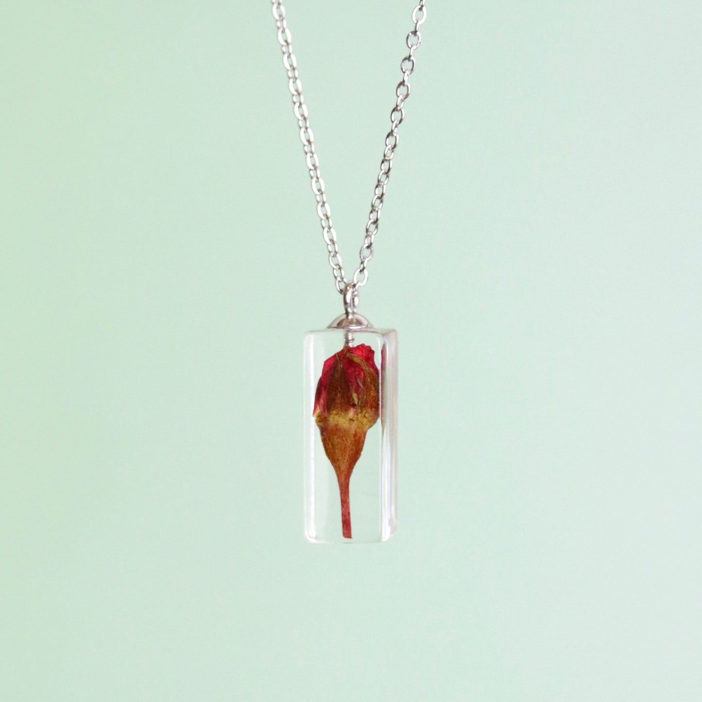 Collana con bocciolo di Rosa rossa in acciaio inossidabile ATTRAVERSO