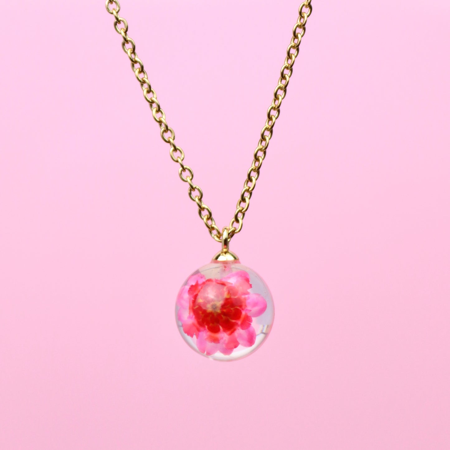 Collana sfera in resina con Glixia rosa e montatura in acciaio inox - collezione BOLLE