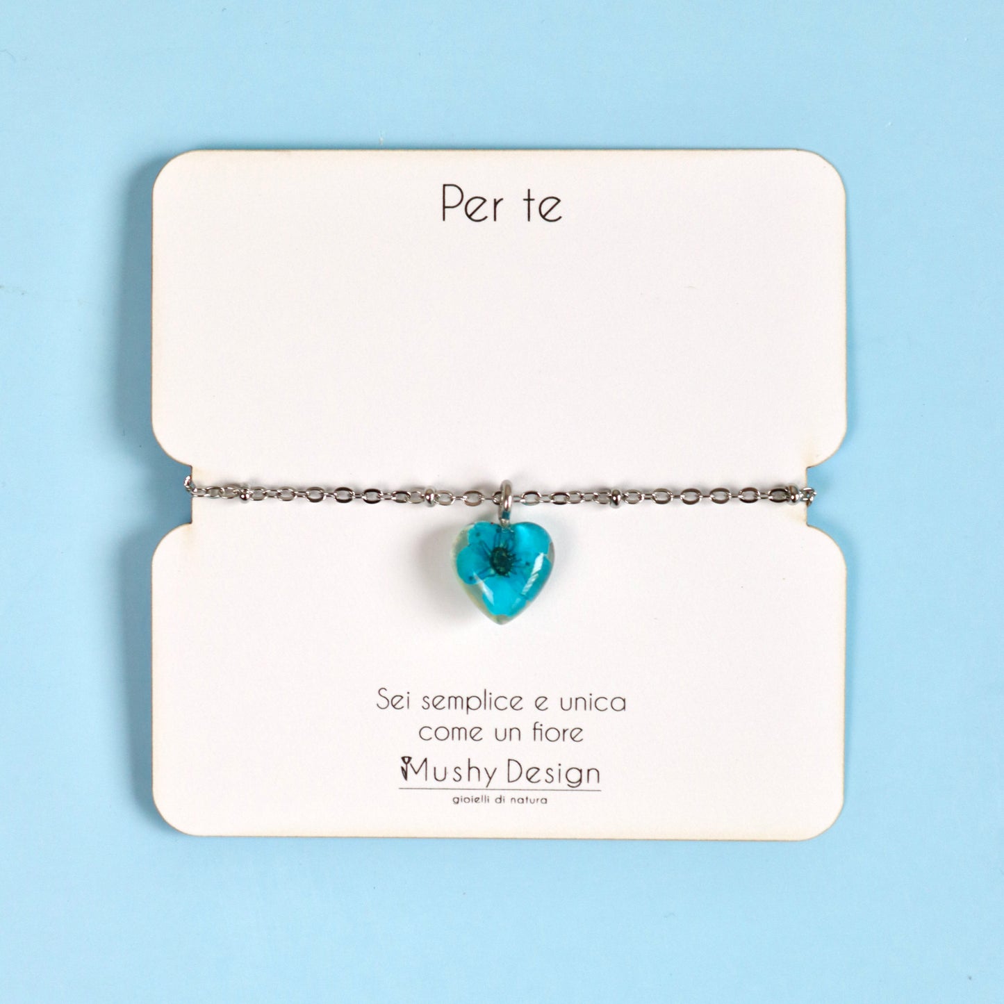Bracciale a cuore in acciaio inossidabile e ciondolo in resina con fiore blu