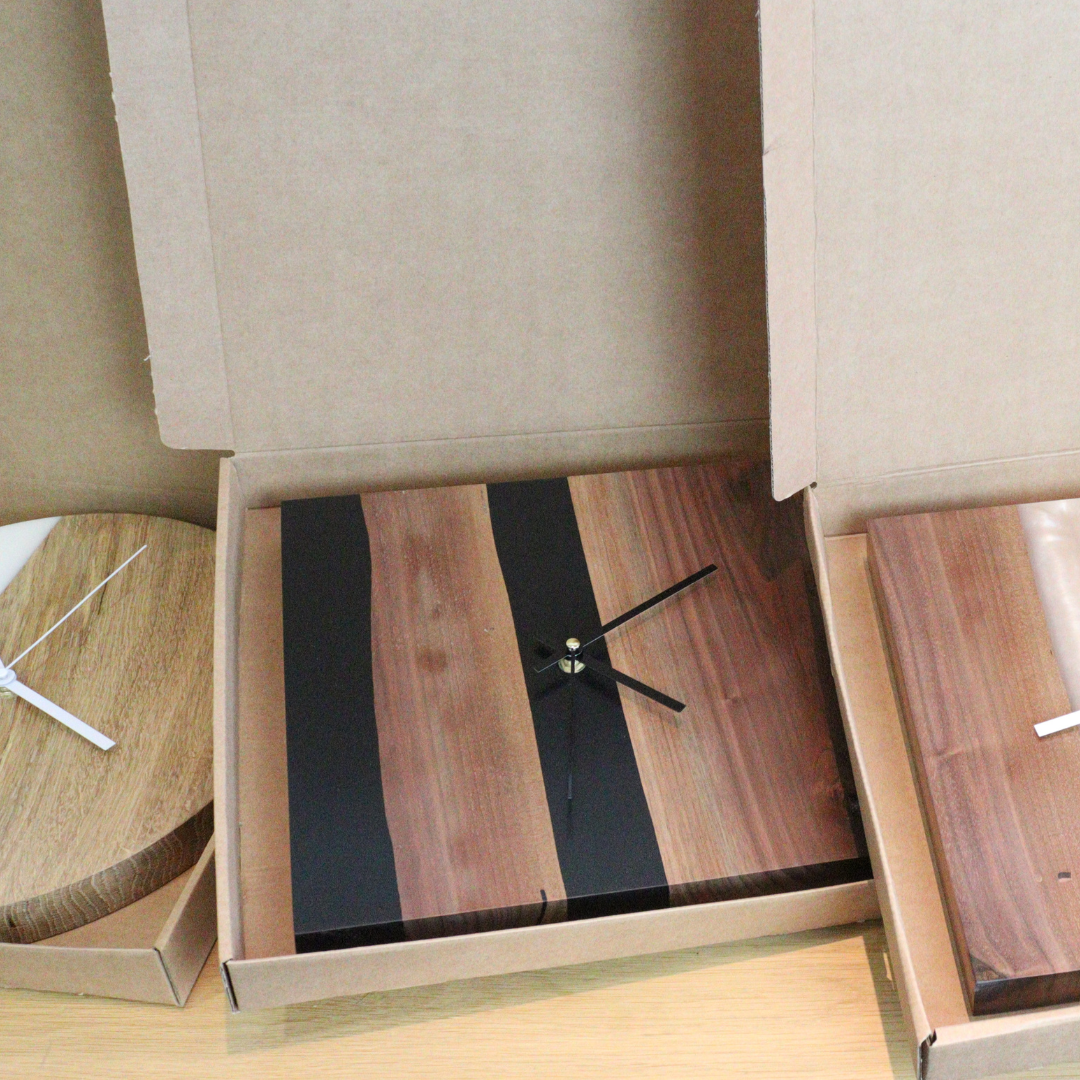 Orologio da parete in legno e resina nera Ø29cm