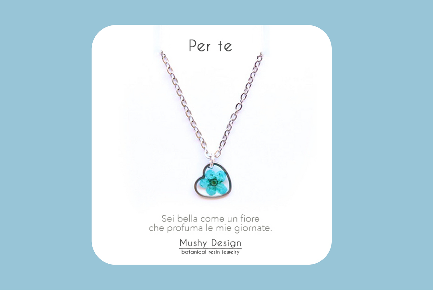 Collana cuore in acciaio inossidabile e ciondolo in resina con fiore selvatico blu