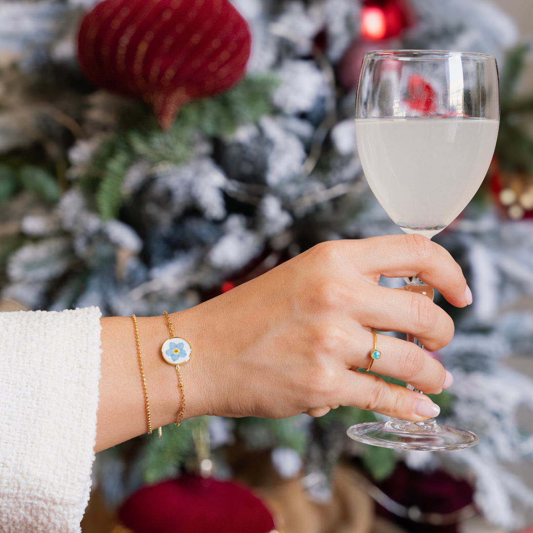 Bracciale in acciaio inox e ciondolo medaglione in resina con fiore vero Nontiscordardimé