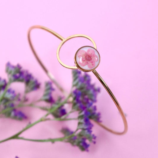 Bracciale ABBRACCIAMI in acciaio inox con resina e fiore selvatico rosa