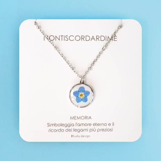 Collana in acciaio inox e ciondolo medaglione in resina con fiore vero Nontiscordardimé