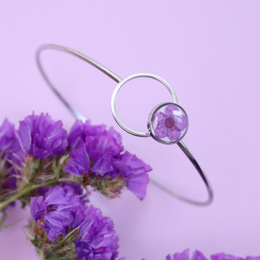 Bracciale ABBRACCIAMI in acciaio inox con resina e fiore selvatico viola