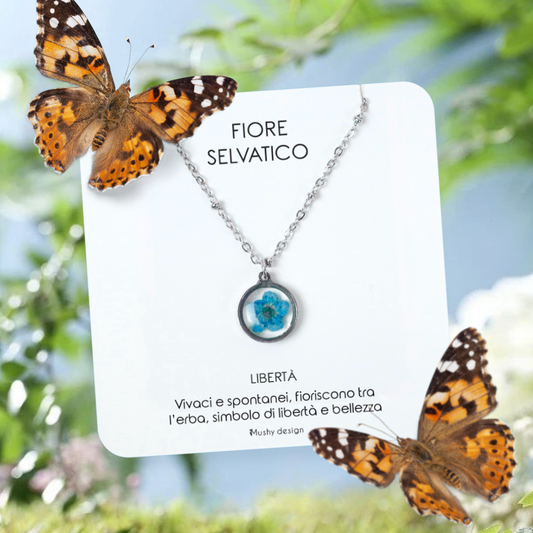 Collana in acciaio inossidabile e ciondolo in resina con fiore blu