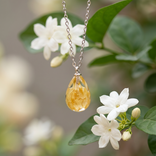 Collana RUGIADA in acciaio inossidabile e ciondolo in resina con Gelsomino