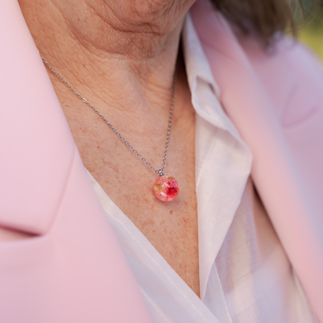 Parure collana + orecchini in acciaio inossidabile e ciondolo in resina con fiore di Glixia rosa