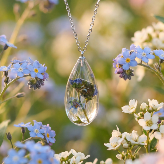 Collana RUGIADA in acciaio inossidabile e ciondolo in resina con Nontiscordardimé