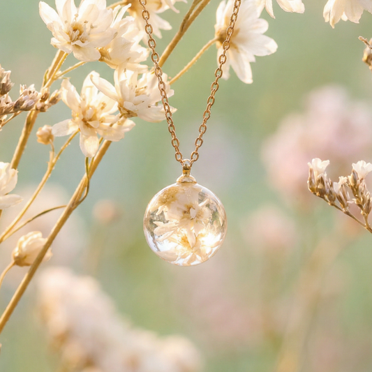 Collana BOLLA in acciaio inox con sfera in resina e fiori di Glixia bianca