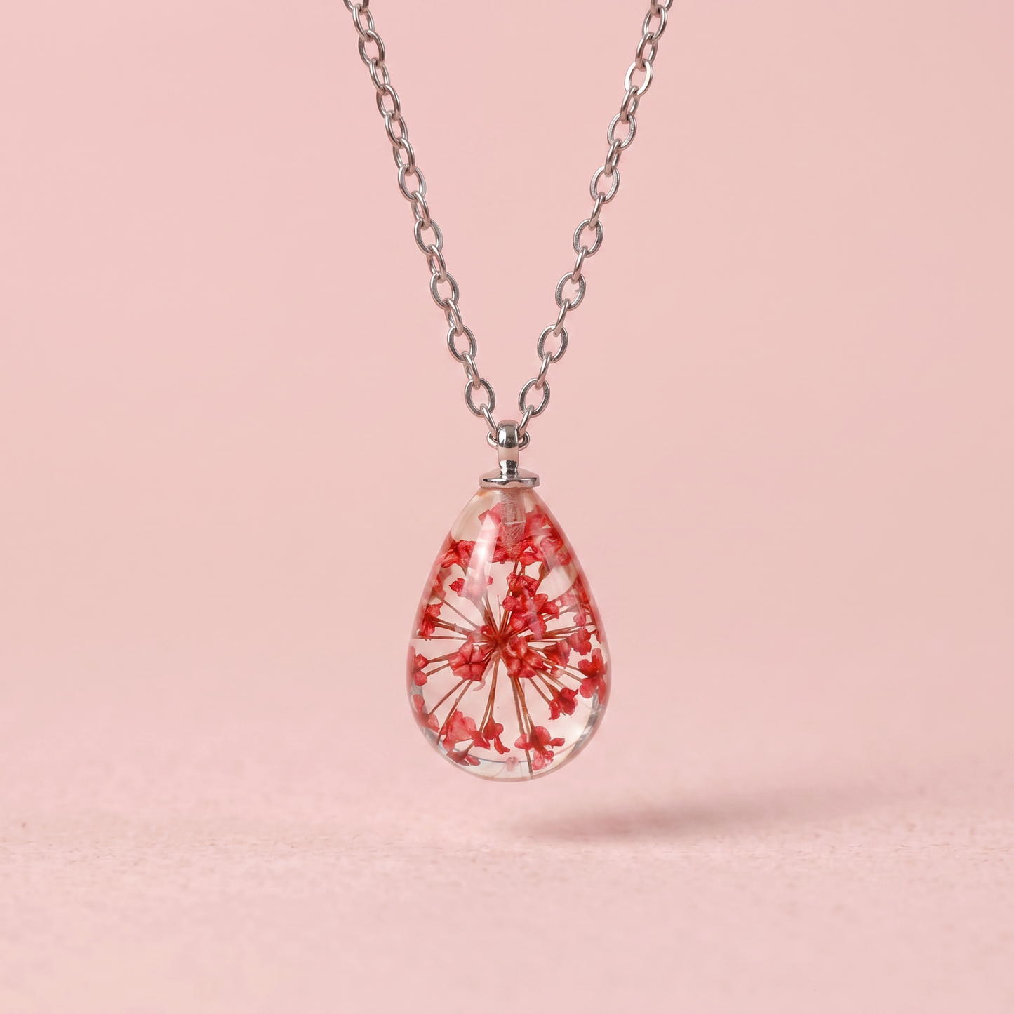Collana RUGIADA in acciaio inossidabile e ciondolo in resina con Carota selvatica rosso