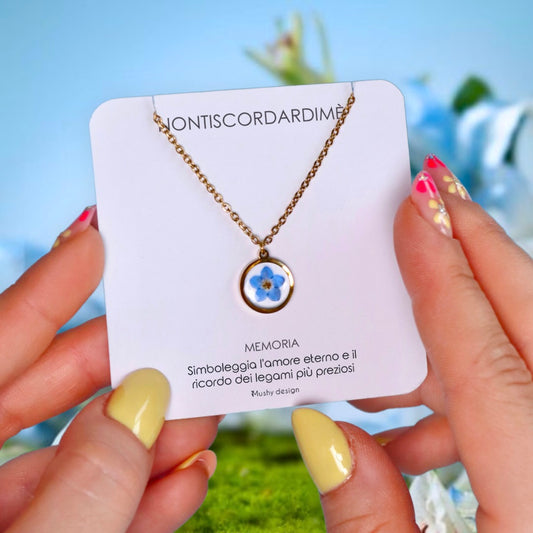 Collana in acciaio inox e ciondolo tondo in resina e Nontiscordardimé
