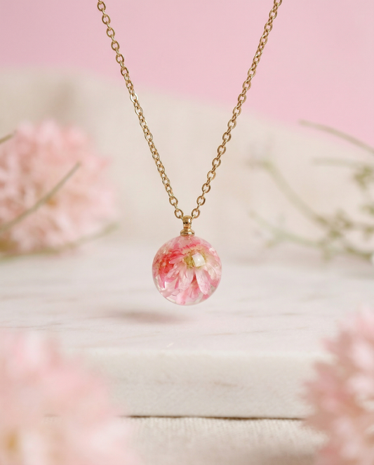 Collana BOLLA in acciaio inox con sfera in resina e fiori di Glixia rosa