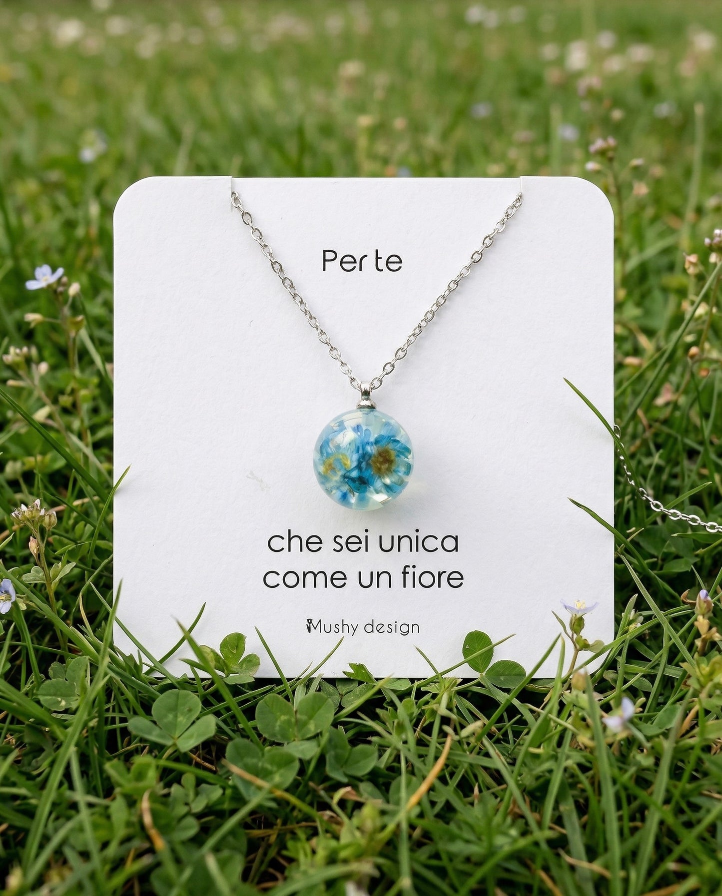 Collana BOLLA in acciaio inox con sfera in resina e fiori di Glixia blu