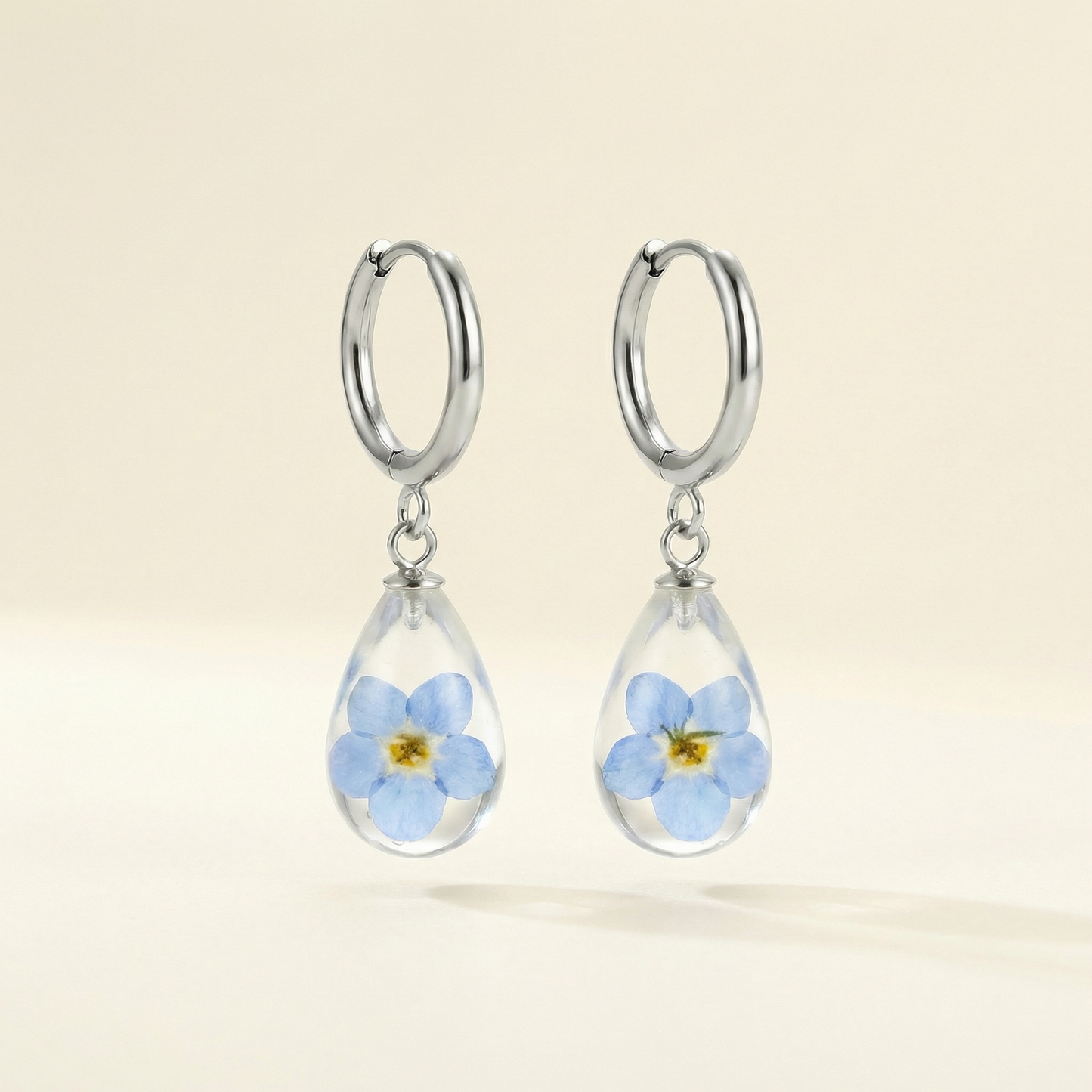 Paio di orecchini RUGIADA pendenti acciaio inox con Nontiscordardimé preservato nella resina