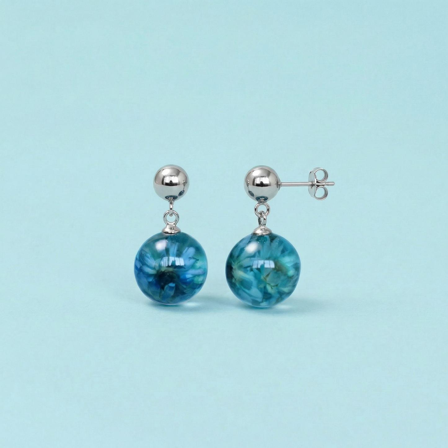 Paio di orecchini MINI BOLLE BLU - sfere pendenti con fiore vero Glixia blu e montatura acciaio inox