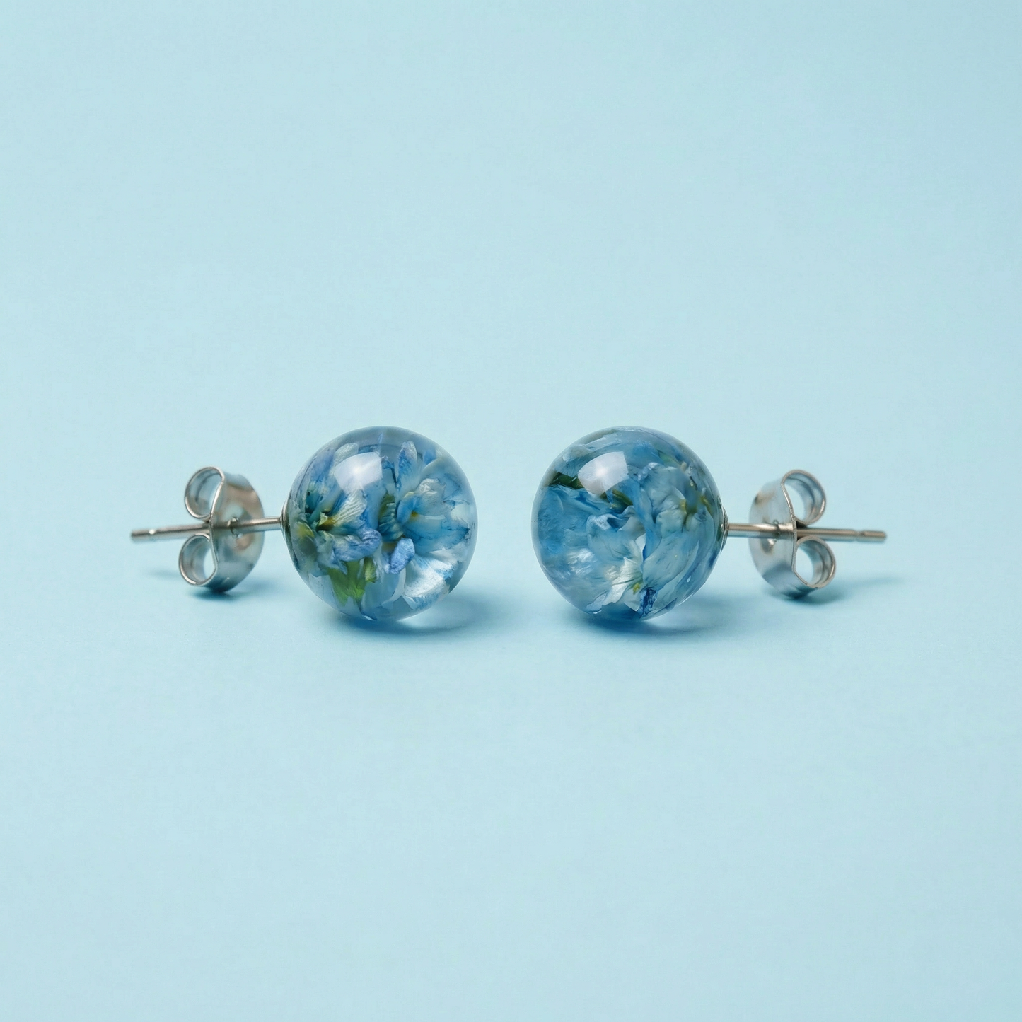 Orecchini a lobo in Resina con Fiori Veri Glixia blu – Acciaio Inox