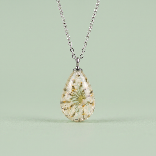 Collana RUGIADA in acciaio inossidabile e ciondolo in resina con Carota selvatica bianca