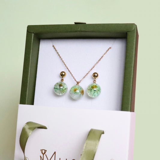 Parure collana + orecchini in acciaio inossidabile e ciondolo in resina con fiore di Glixia verde