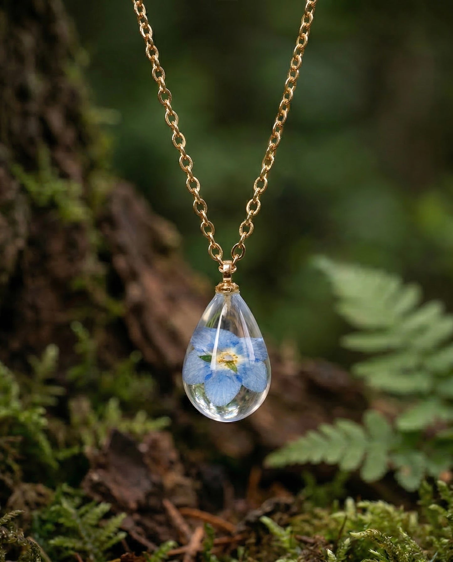 Collana RUGIADA in acciaio inossidabile e ciondolo in resina con Nontiscordardimé