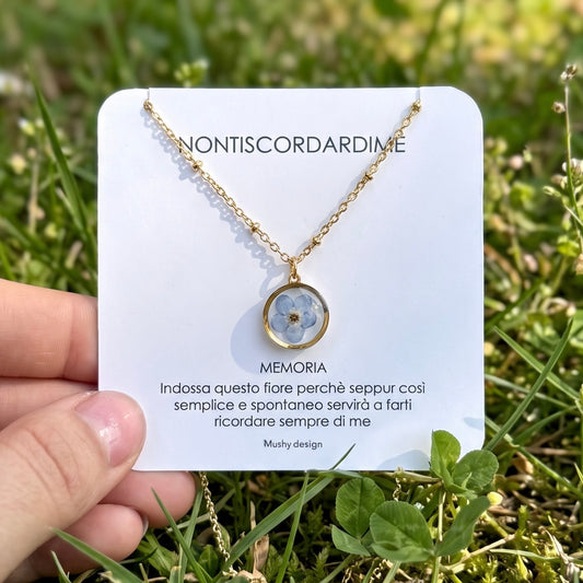 Collana in acciaio inox e ciondolo in resina e Nontiscordardimé