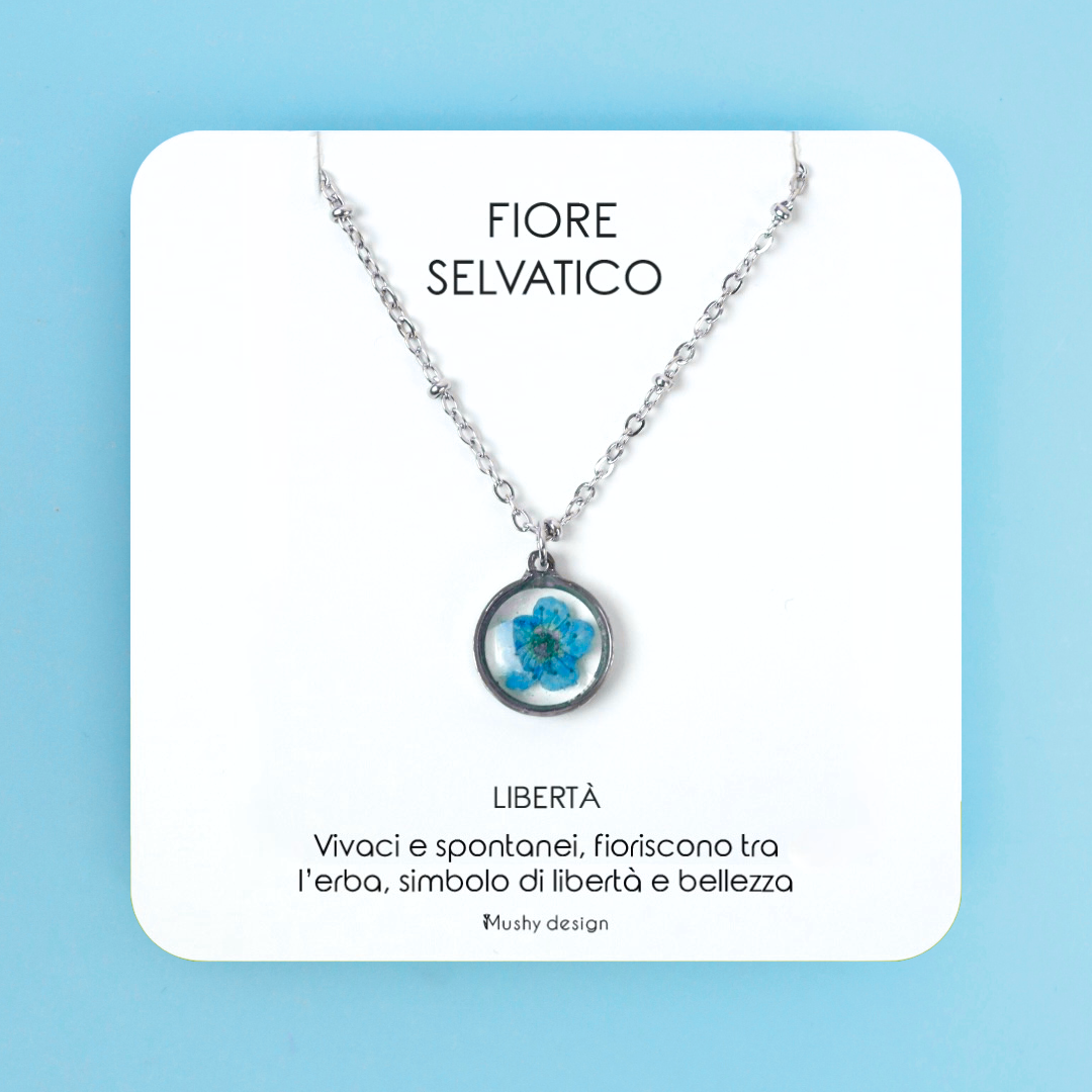 Collana in acciaio inossidabile e ciondolo in resina con fiore blu